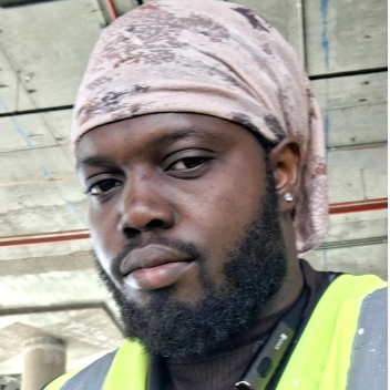Isaac , Ghanaian driver, in Jeddah